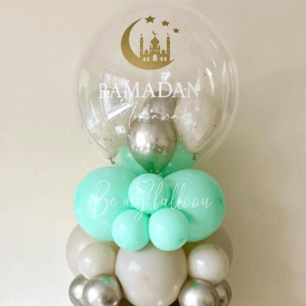 A set of balloons with small mint-green balloons